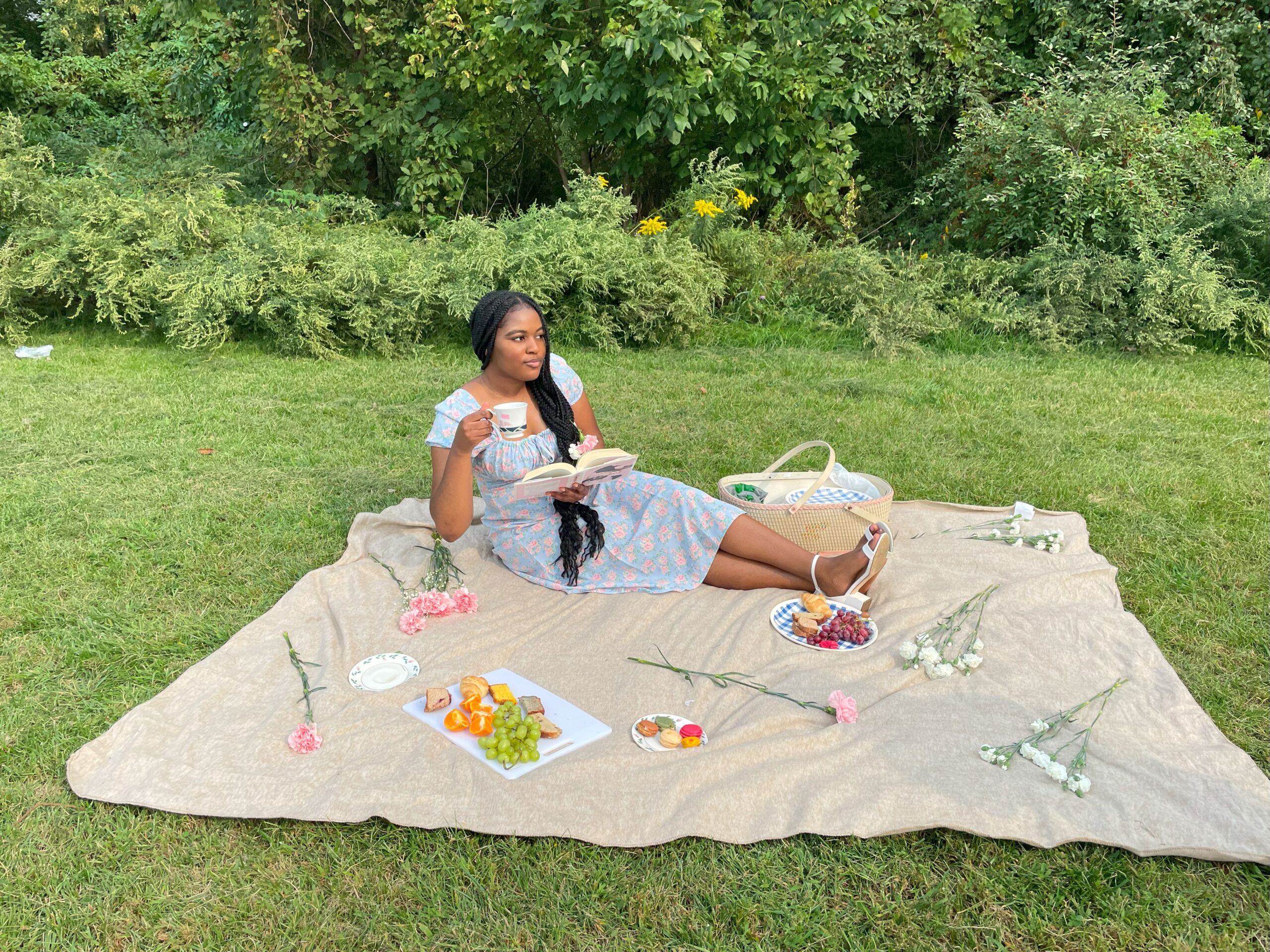 girl sitting out having a picnic